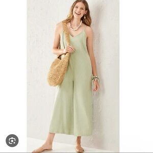Charlie Paige Linen Blend Sage Green Sleevesless Wide
Leg Romper with Pockets